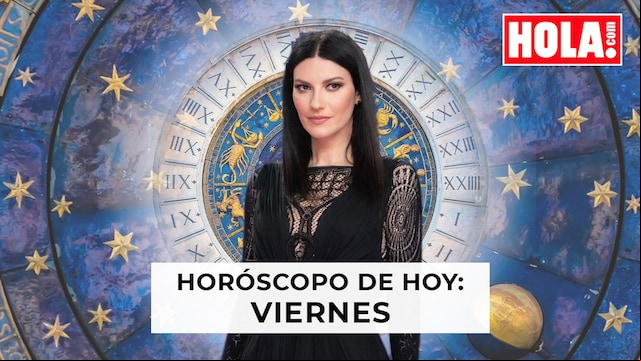 Laura Pausini en primer plano, de fondo la rueda del zodiaco
