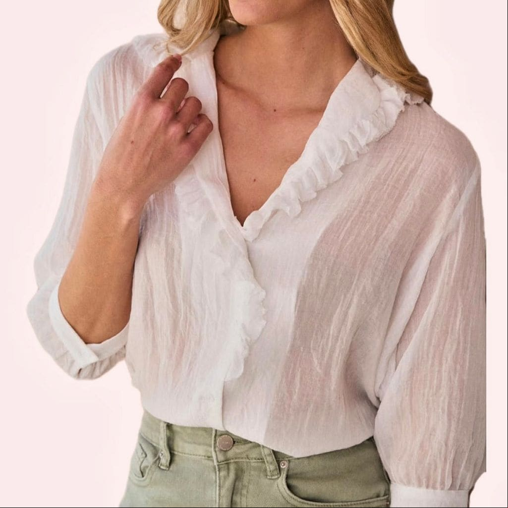 Blusa blanca de Polín et Moi con cuello en pico