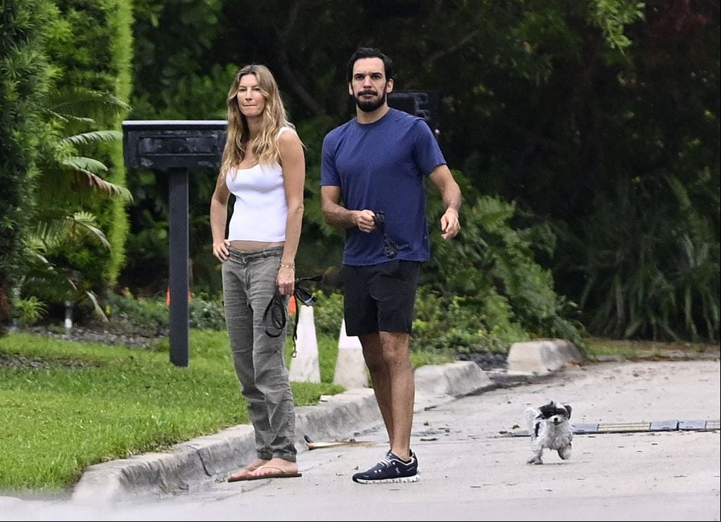 Photo Â© 2024 Mega/The Grosby Group

 EXCLUSIVE

Gisele BÃ¼ndchen and handsome boyfriend Joaquim Valente put on a loved-up display as they walk the dogs in Surfside, Florida. In fact, such is the strength of their relationship, Valente has moved into the supermodelâs $11.5 million newly-renovated Miami mansion, debunking false rumors of a split. Breakup speculation around the catwalk queen and her jiujitsu trainer boyfriend, 36, could not be further from the truth, as these exclusive photos show the Brazilian-born lovebirds have taken their romance to the next level by setting up home together. These stunning aerial images reveal the newly renovated dream home, where the two have been staying together, in all its glory having undergone a huge facelift. Nestled in a ritzy neighborhood just across Biscayne Bay from ex-husband Tom Bradyâs newly-built mansion, the 43-year-oldâs sleek two-storey property boasts a glistening pool, sprawling sundeck and freshly resurfaced balcony off the master bedroom. A new roof and floor-to-ceiling windows were also part of the contemporary makeover, which has spanned 18 months. Further disproving reports that their love affair was over, these aerial shots clearly show Valenteâs truck parked in the driveway of the residence. And debunks claims that their affair was âfizzling outâ amid stress sparked by public attention and Bradyâs brutal Netflix roast. These images prove the duo are still firmly an item although they have been staying low key and not been pictured together in months. Gisele is known to have been traveling to and from her native Brazil in the wake of her motherâs recent death. She had splashed out on the Surfside fixer-upper in November 2022 while NFL legend Brady kept the ambitious new construction they had originally started together just a stoneâs throw away on Indian Creek Island, dubbed âBillionaire Bunkerâ. During her own renovation project, Gisele had been staying at a different pad cl