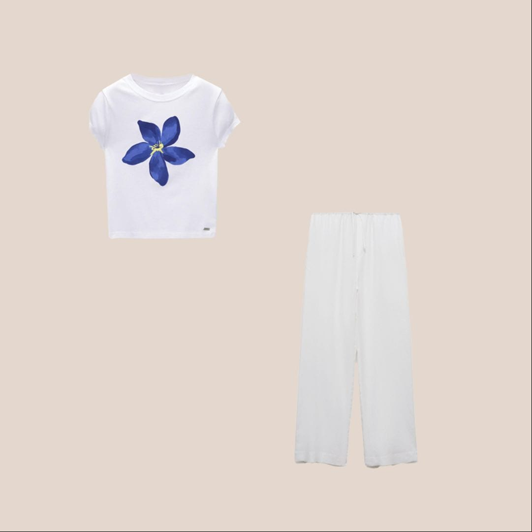 Top con flor auzl y pantalones de lino blancos