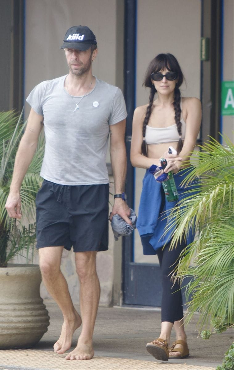 Chris Martina and Dakota Johnson