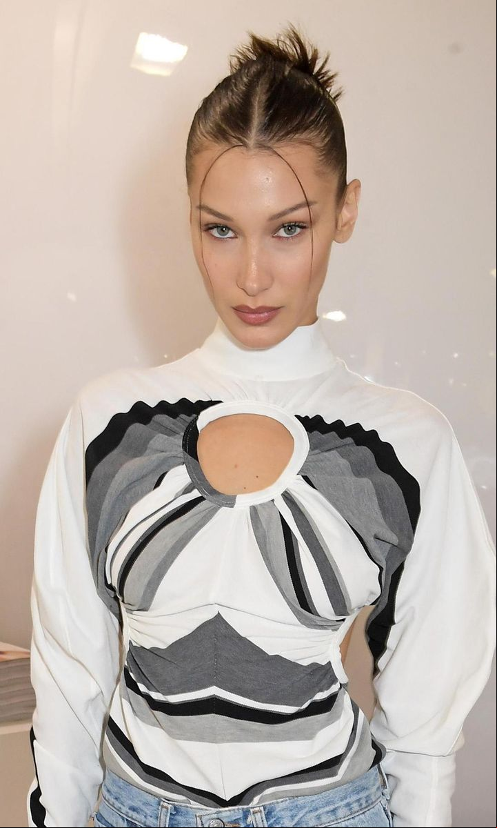 Bella Hadid wearing two wisps of hair at the front of her hairstyle